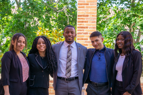 SIEML 2022 case competition winning team group photo taken outside of a UCLA Anderson building