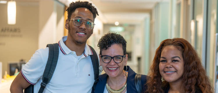 Image of scholars with UCSD Dean Lisa Ordonez